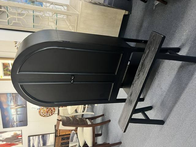 Decorative black arched cabinet with wooden bench